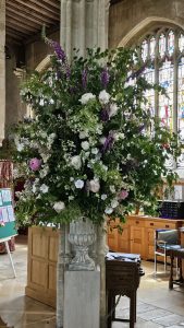 Flowers in front of pillar South Side